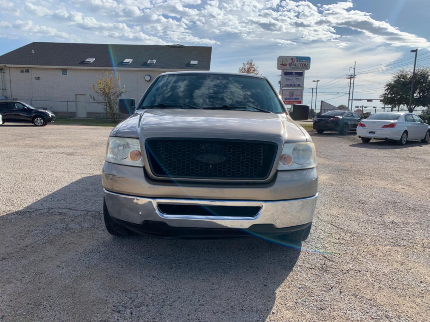 2006 Gold /Tan Ford F-150 Lariat SuperCrew 2WD (1FTPW12516K) with an 5.4L V6 SOHC 16V engine, Automatic transmission, located at 1830 North Belt Line Road, Irving, TX, 75061, (469) 524-0199, 32.834373, -96.993584 - Photo#0